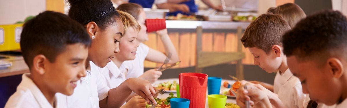 Children eating a school dinner